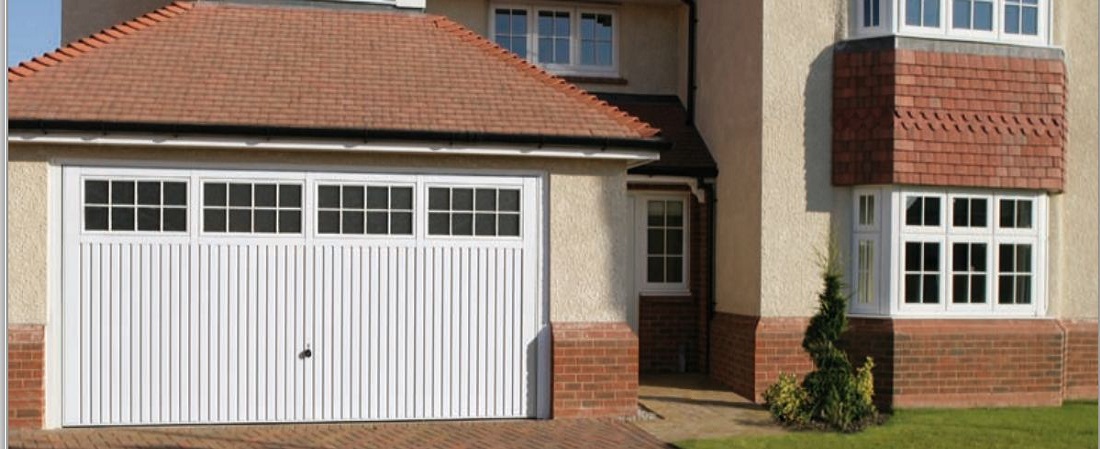 White up and over garage door fitted to a house in Birmingham